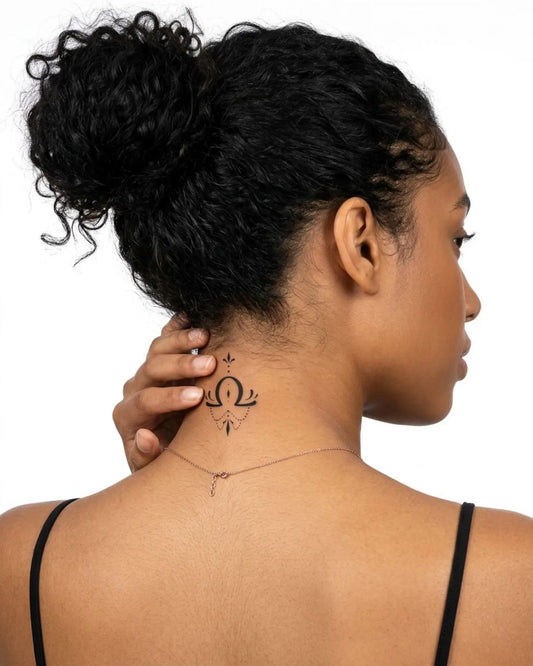 INKY Libra 2 semi-permanent tattoo applied on a woman – 2 x 2 in (4x4 cm) design, realistic ink look, lasts 10 days