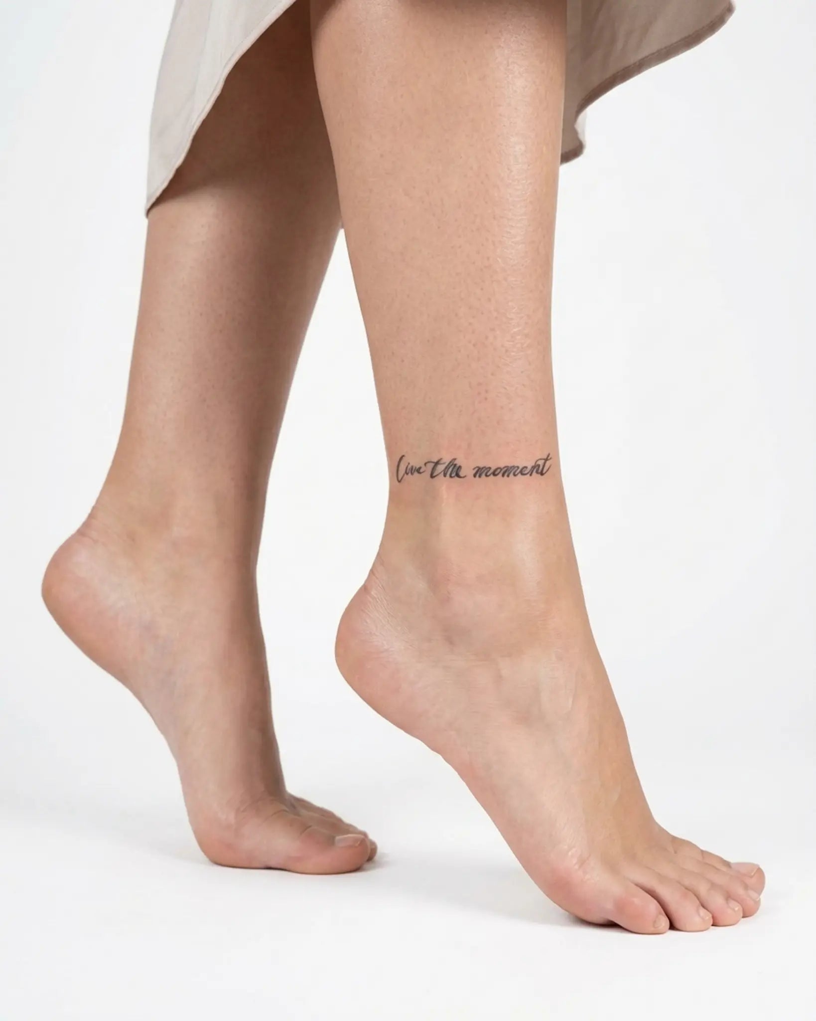 INKY Live Moment semi-permanent tattoo applied on a woman – 2 x 2 in (4x4 cm) design, realistic ink look, lasts 10 days