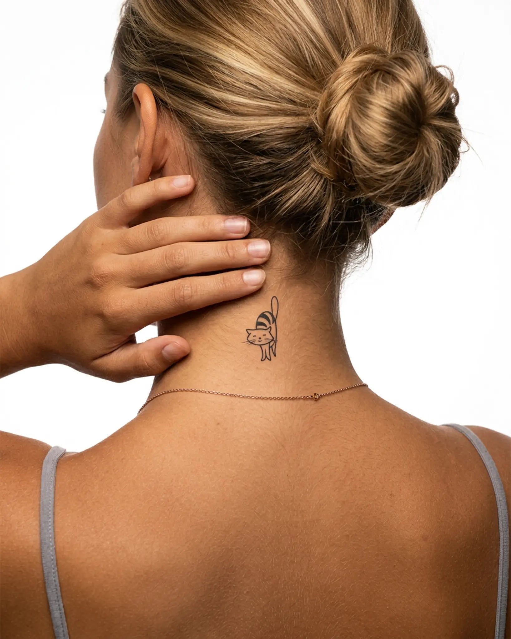INKY Cat Stretch semi-permanent tattoo applied on a woman – 2 x 2 in (4x4 cm) design, realistic ink look, lasts 10 days
