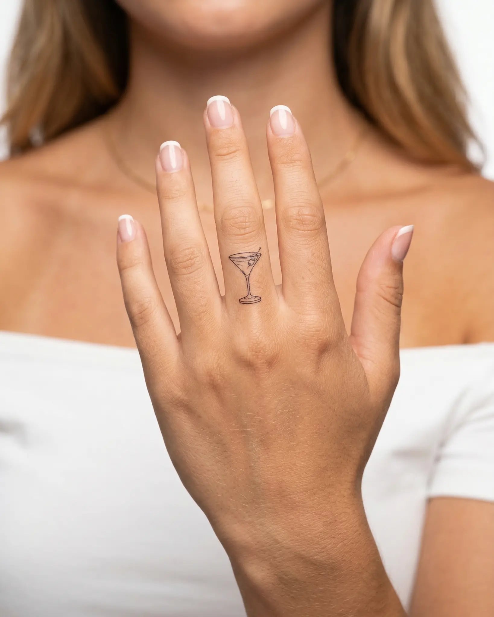 INKY Martini Time semi-permanent tattoo applied on a woman – 0.5 x 0.5 in (1x1 cm) design, realistic ink look, lasts 10 days