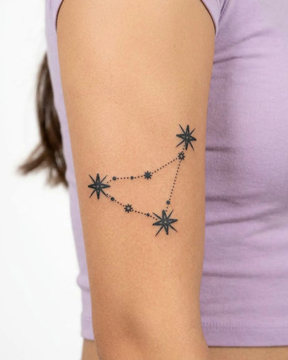 INKY Celestial Capricorn 2 semi-permanent tattoo applied on a woman – 3 x 3 in (7x7 cm) design, realistic ink look, lasts 10 days