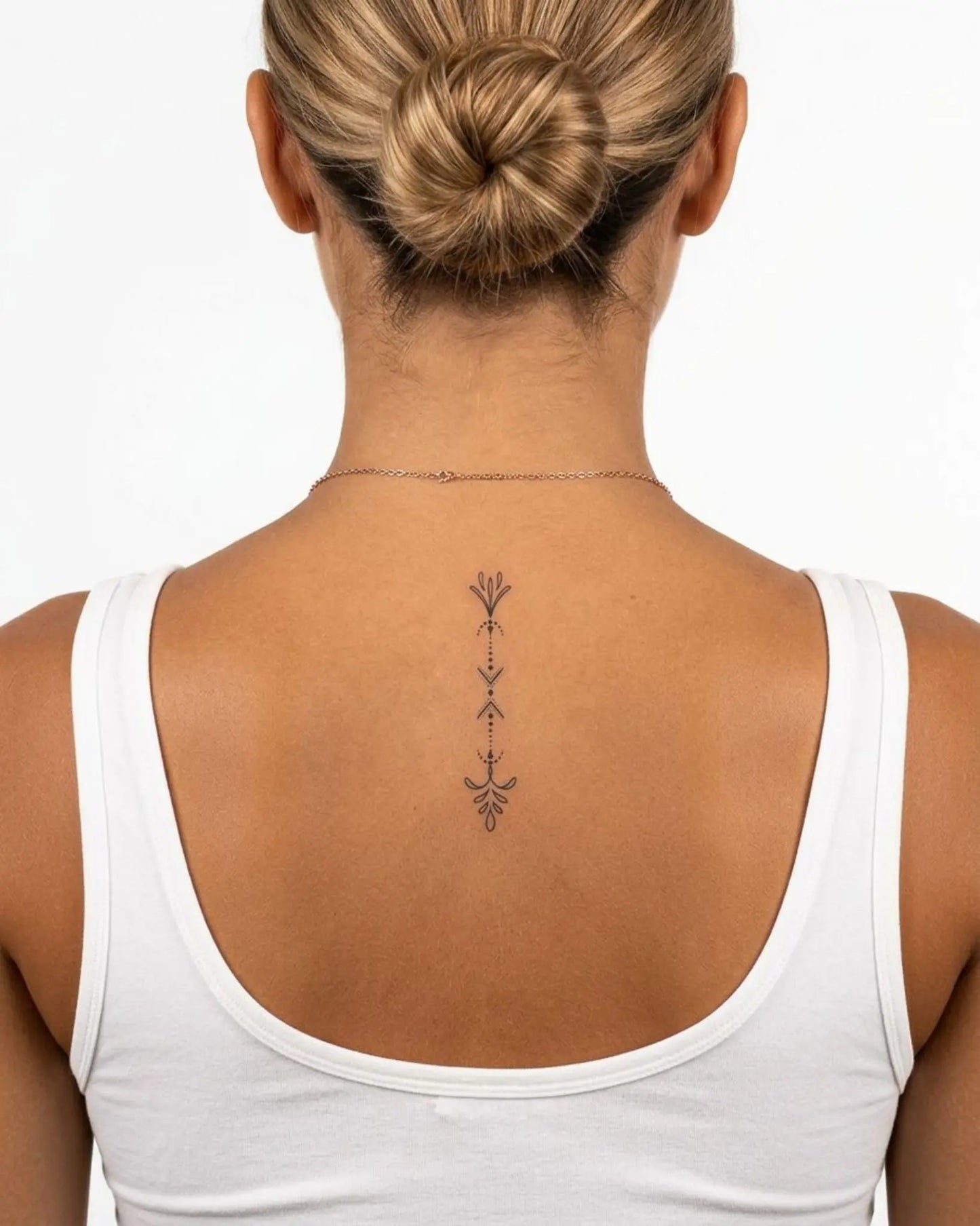 INKY Dot Line Art semi-permanent tattoo applied on a woman – 2 x 4 in (6x10 cm) design, realistic ink look, lasts 10 days