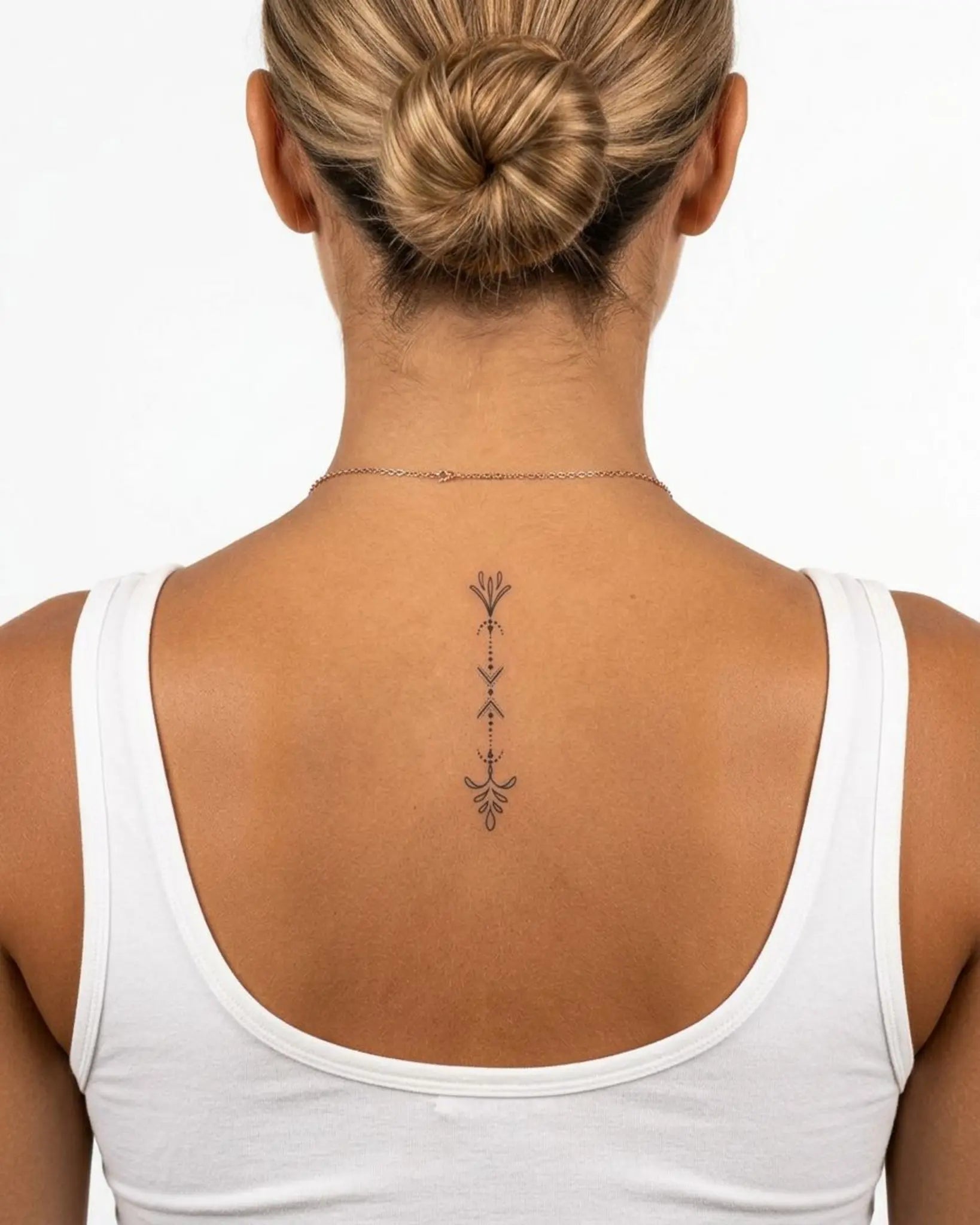 INKY Dot Line Art semi-permanent tattoo applied on a woman – 2 x 4 in (6x10 cm) design, realistic ink look, lasts 10 days