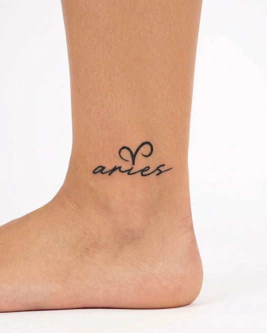 INKY Aries Script semi-permanent tattoo applied on a woman – 2 x 2 in (4x4 cm) design, realistic ink look, lasts 10 days