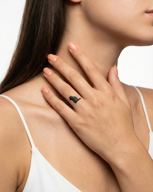 INKY Silly Cat semi-permanent tattoo applied on a woman – 0.5 x 0.5 in (1x1 cm) design, realistic ink look, lasts 10 days