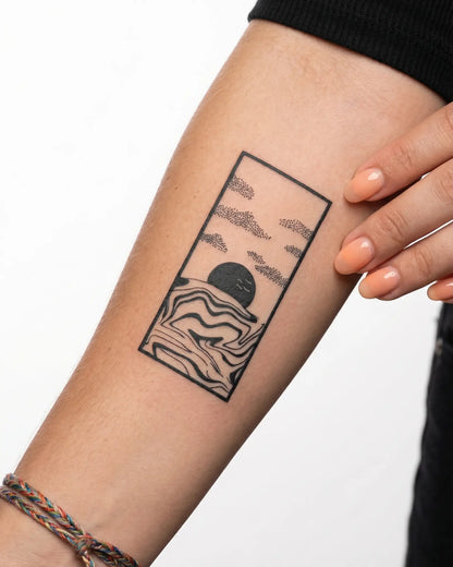 INKY Horizon Flow semi-permanent tattoo applied on a woman – 2 x 4 in (6x10 cm) design, realistic ink look, lasts 10 days