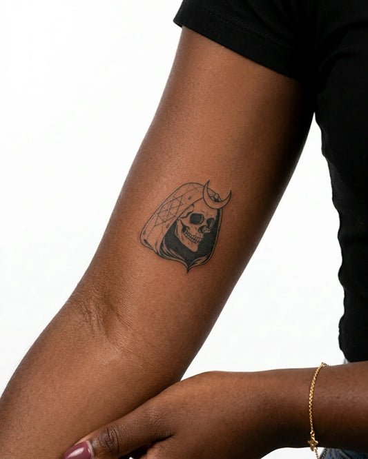 INKY Moon Reaper semi-permanent tattoo applied on a woman – 3 x 3 in (7x7 cm) design, realistic ink look, lasts 10 days