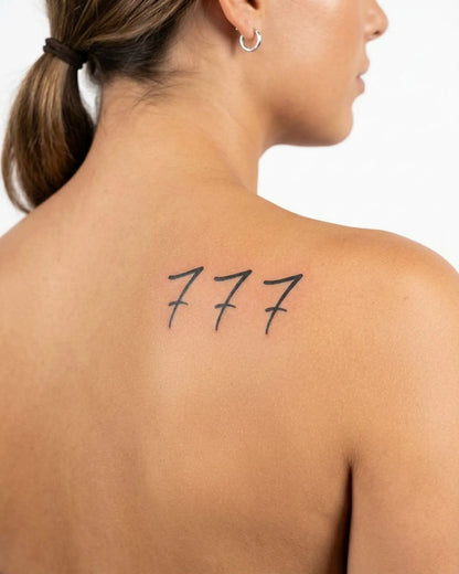 INKY Triple 7s 2 semi-permanent tattoo applied on a woman – 3 x 3 in (7x7 cm) design, realistic ink look, lasts 10 days