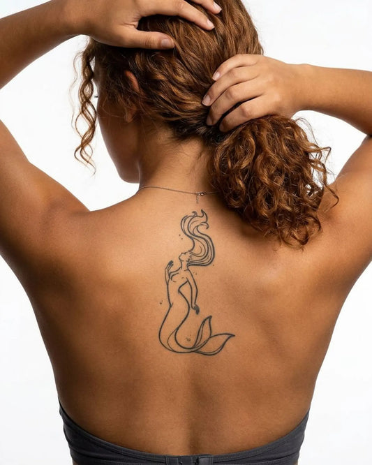 INKY Ocean Siren 2 semi-permanent tattoo applied on a woman – 4 x 7 in (10x17 cm) design, realistic ink look, lasts 10 days