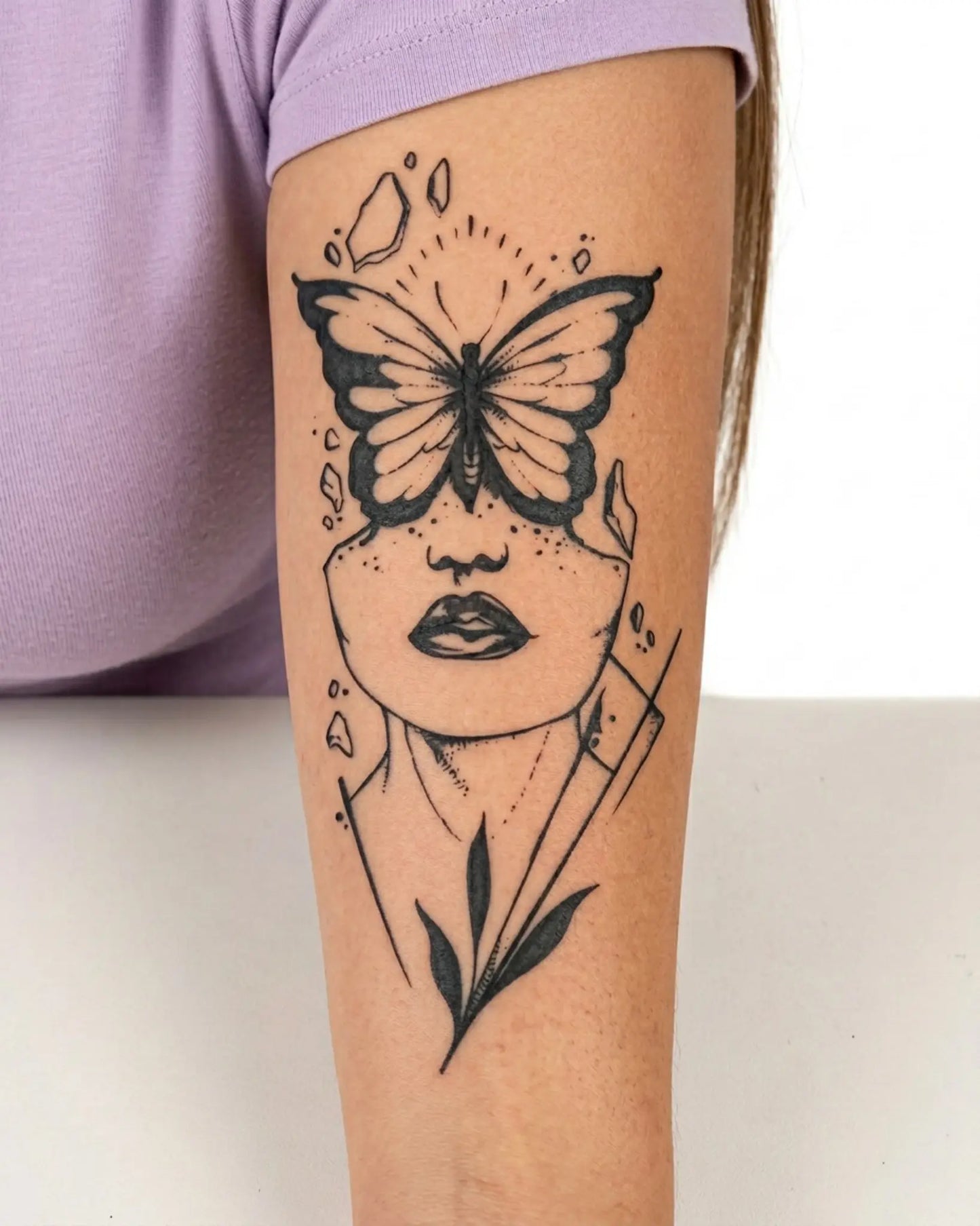 INKY Metamorphosis semi-permanent tattoo applied on a woman – 4 x 7 in (10x17 cm) design, realistic ink look, lasts 10 days