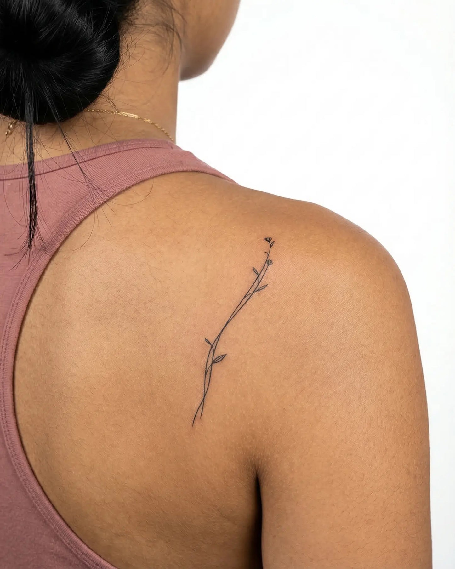 INKY Slim Bloom semi-permanent tattoo applied on a woman – 2 x 4 in (6x10 cm) design, realistic ink look, lasts 10 days