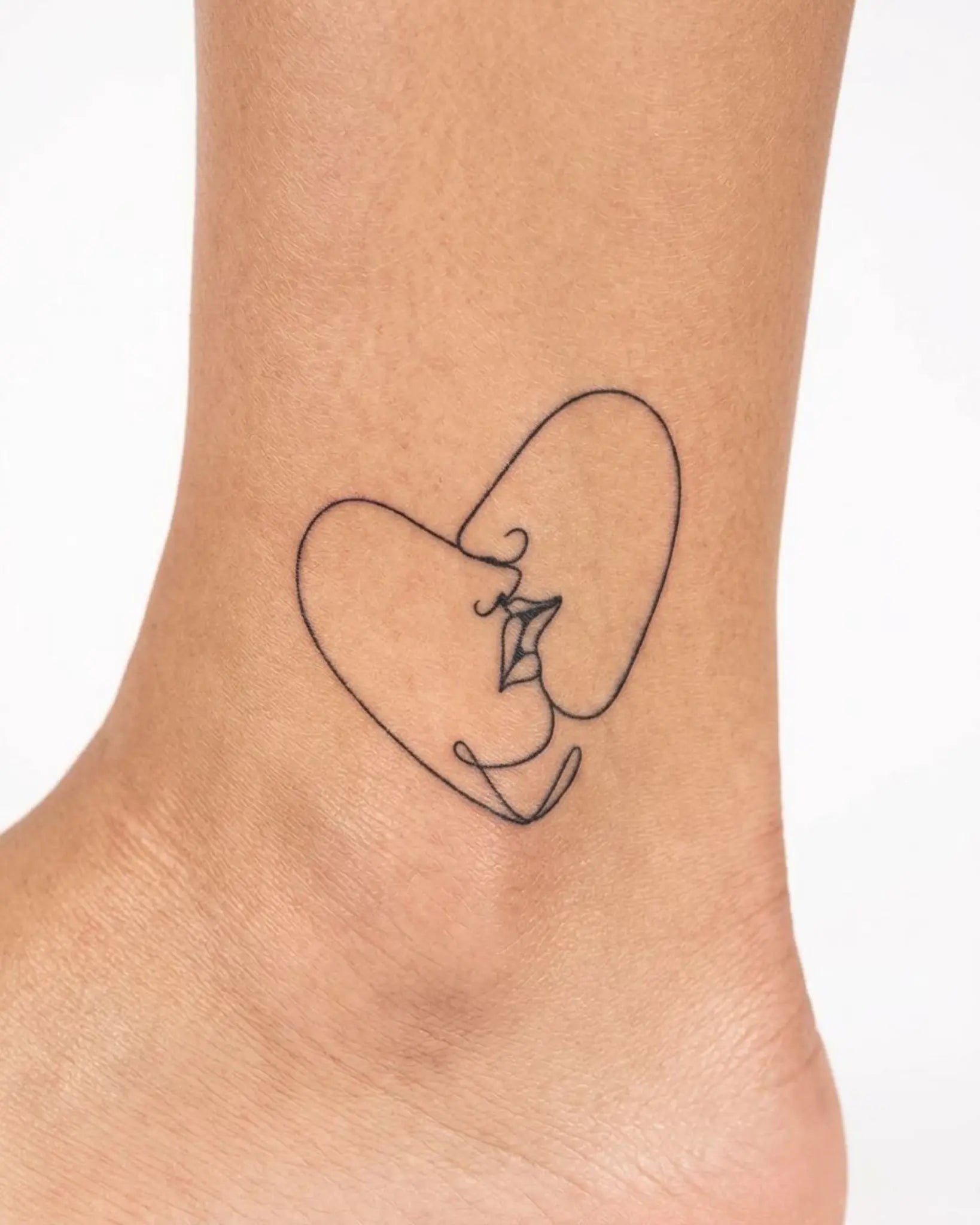 INKY Love Line 3 semi-permanent tattoo applied on a woman – 2 x 2 in (4x4 cm) design, realistic ink look, lasts 10 days