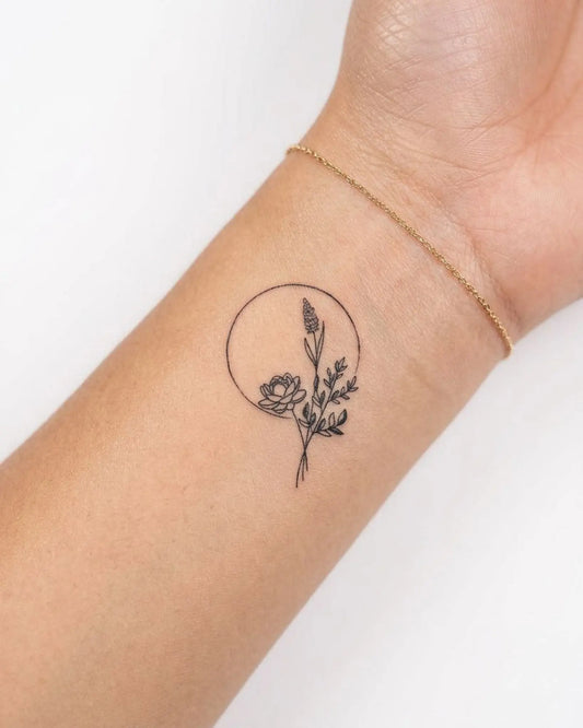 INKY Botanical Arc semi-permanent tattoo applied on a woman – 2 x 2 in (4x4 cm) design, realistic ink look, lasts 10 days