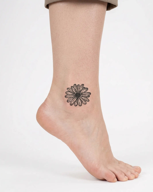 INKY Daisy Sketch semi-permanent tattoo applied on a woman – 2 x 2 in (4x4 cm) design, realistic ink look, lasts 10 days