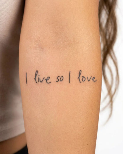INKY Live & Love semi-permanent tattoo applied on a woman – 2 x 4 in (6x10 cm) design, realistic ink look, lasts 10 days