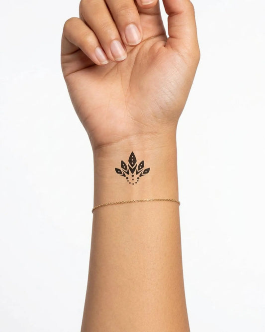 INKY Tribal Petal semi-permanent tattoo applied on a woman – 2 x 2 in (4x4 cm) design, realistic ink look, lasts 10 days