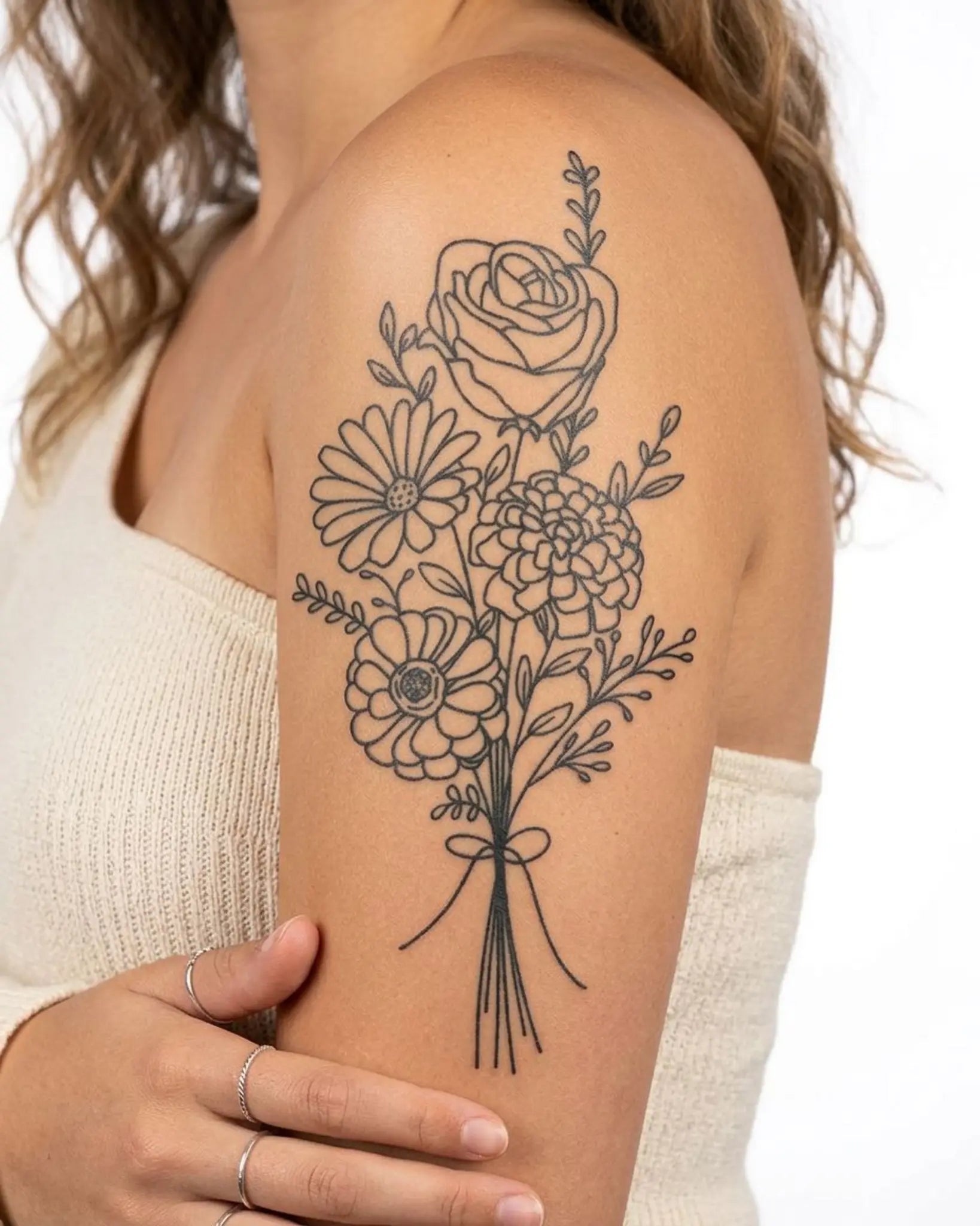 INKY Floral Bouque semi-permanent tattoo applied on a woman – 4 x 7 in (10x17 cm) design, realistic ink look, lasts 10 days