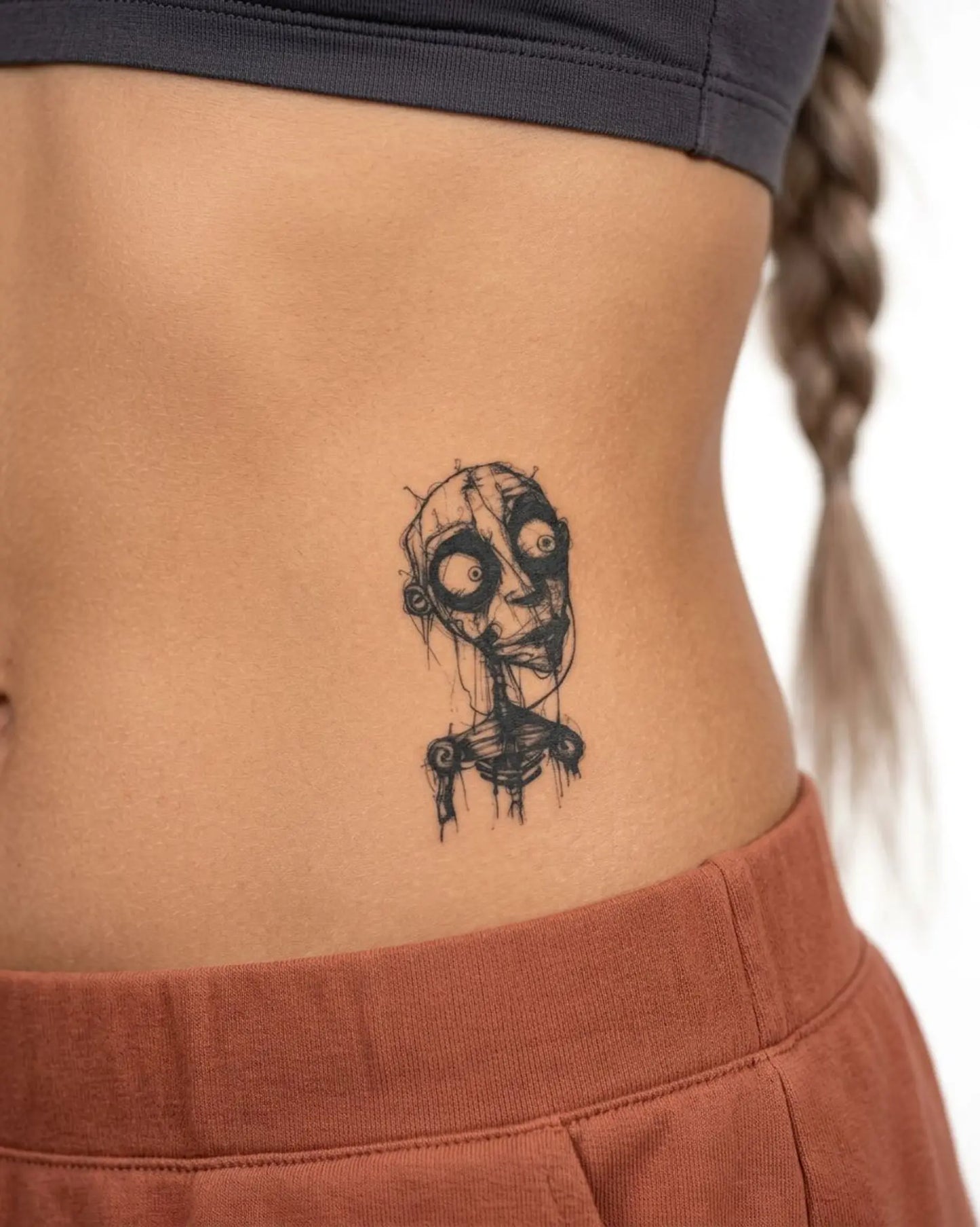 INKY Eerie Sketch semi-permanent tattoo applied on a woman – 3 x 3 in (7x7 cm) design, realistic ink look, lasts 10 days