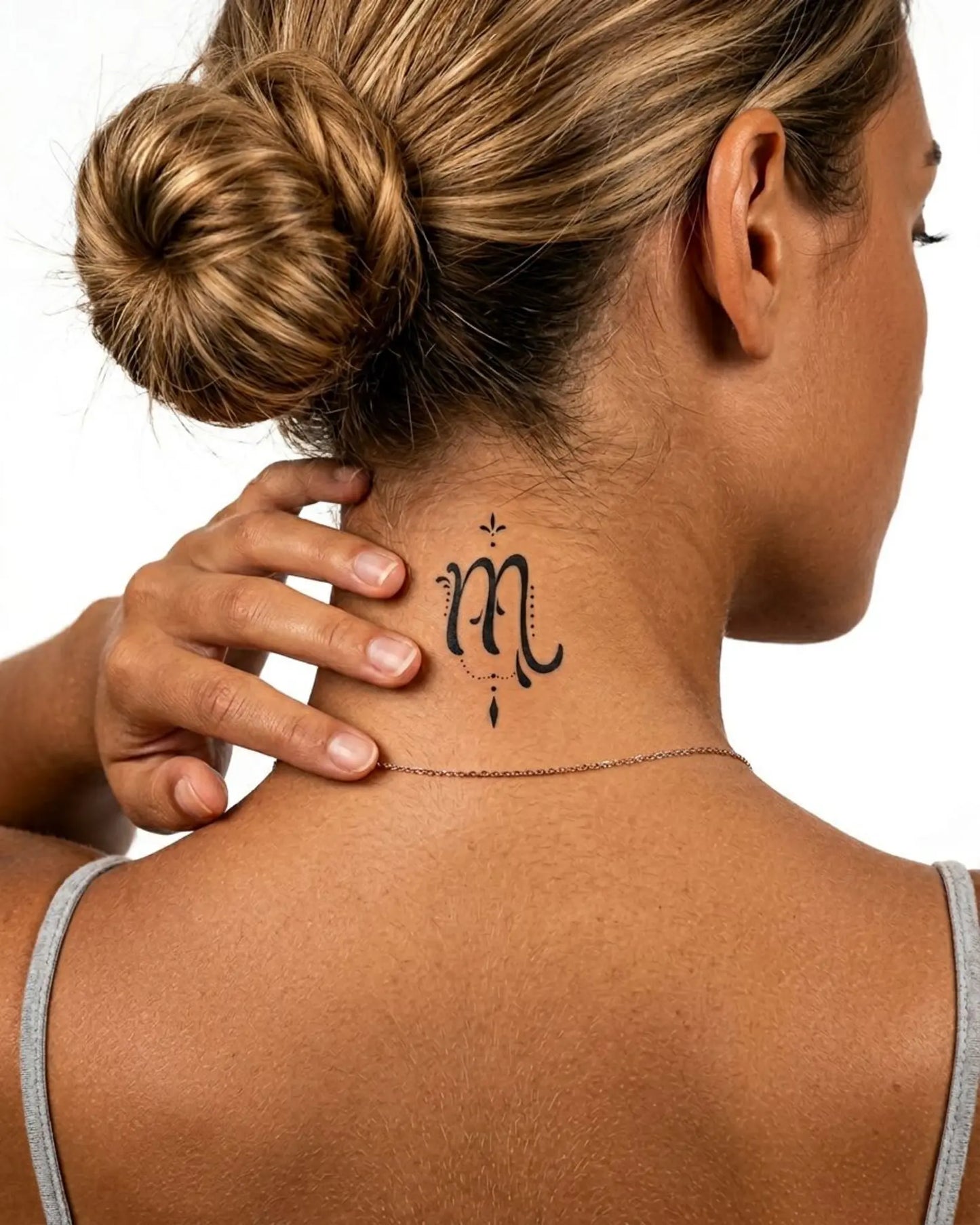 INKY Virgo semi-permanent tattoo applied on a woman – 2 x 2 in (4x4 cm) design, realistic ink look, lasts 10 days