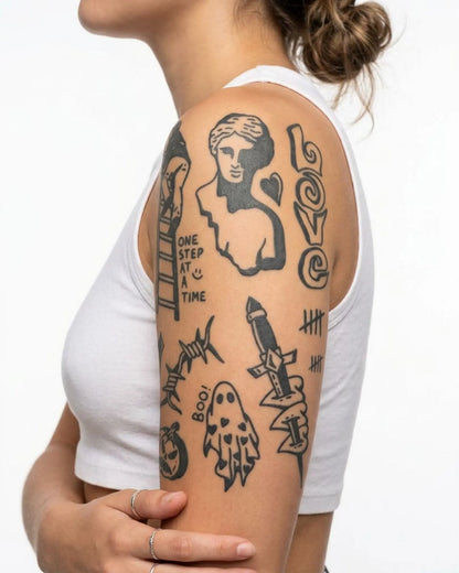 INKY Urban Doodles semi-permanent tattoo applied on a woman – 4 x 7 in (10x17 cm) design, realistic ink look, lasts 10 days