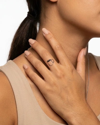 INKY Coffee Time semi-permanent tattoo applied on a woman – 0.5 x 0.5 in (1x1 cm) design, realistic ink look, lasts 10 days