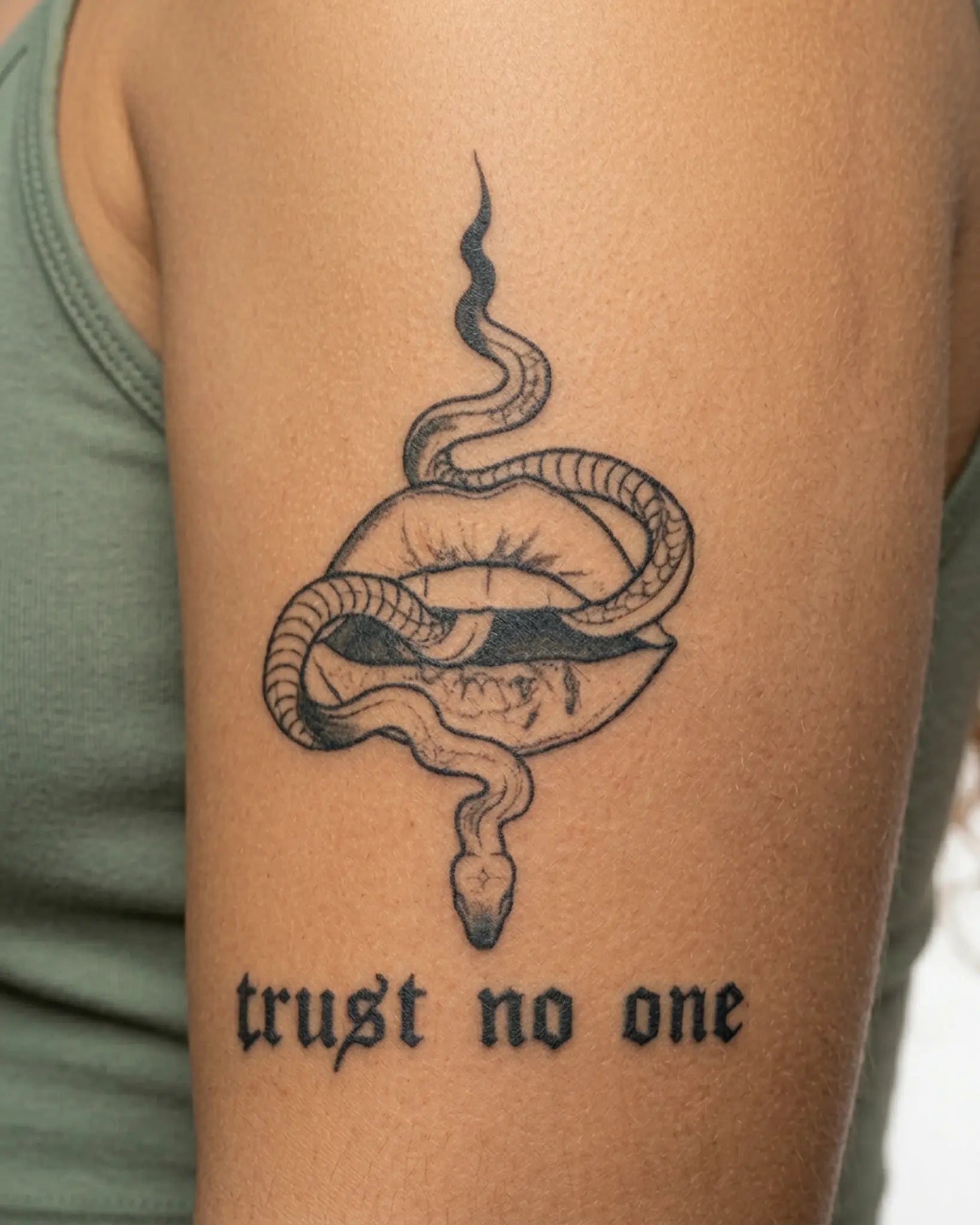INKY Dark Truth semi-permanent tattoo applied on a woman – 3 x 4 in (7x10 cm) design, realistic ink look, lasts 10 days