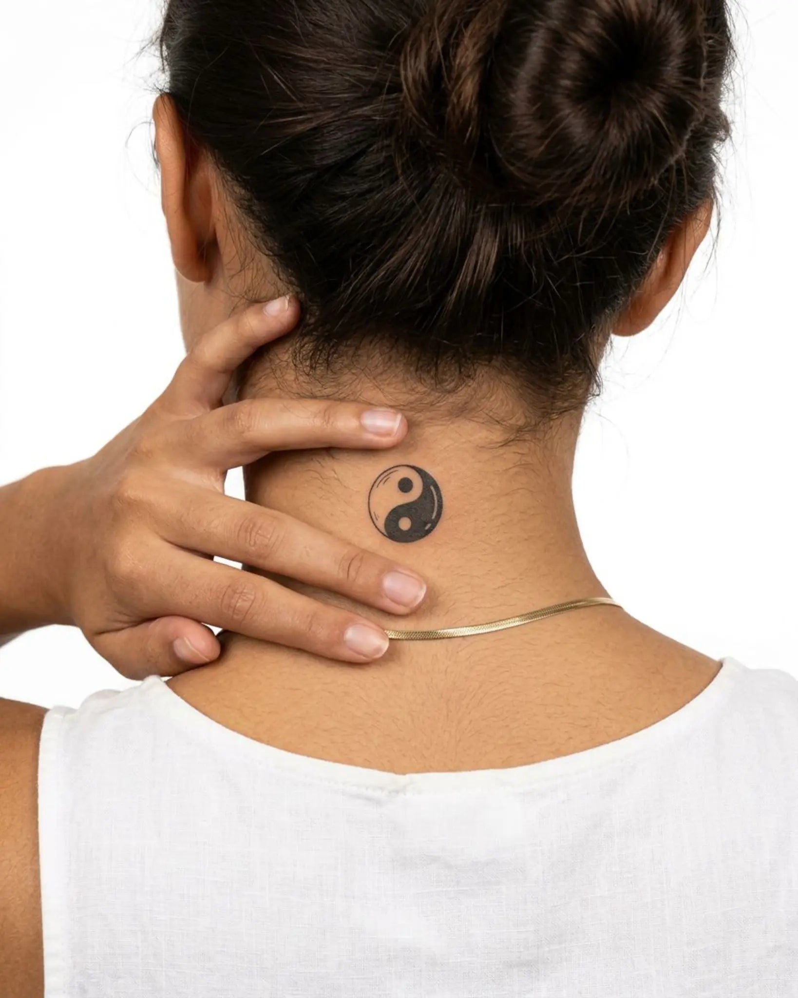 INKY Yin Yang semi-permanent tattoo applied on a woman – 2 x 2 in (4x4 cm) design, realistic ink look, lasts 10 days