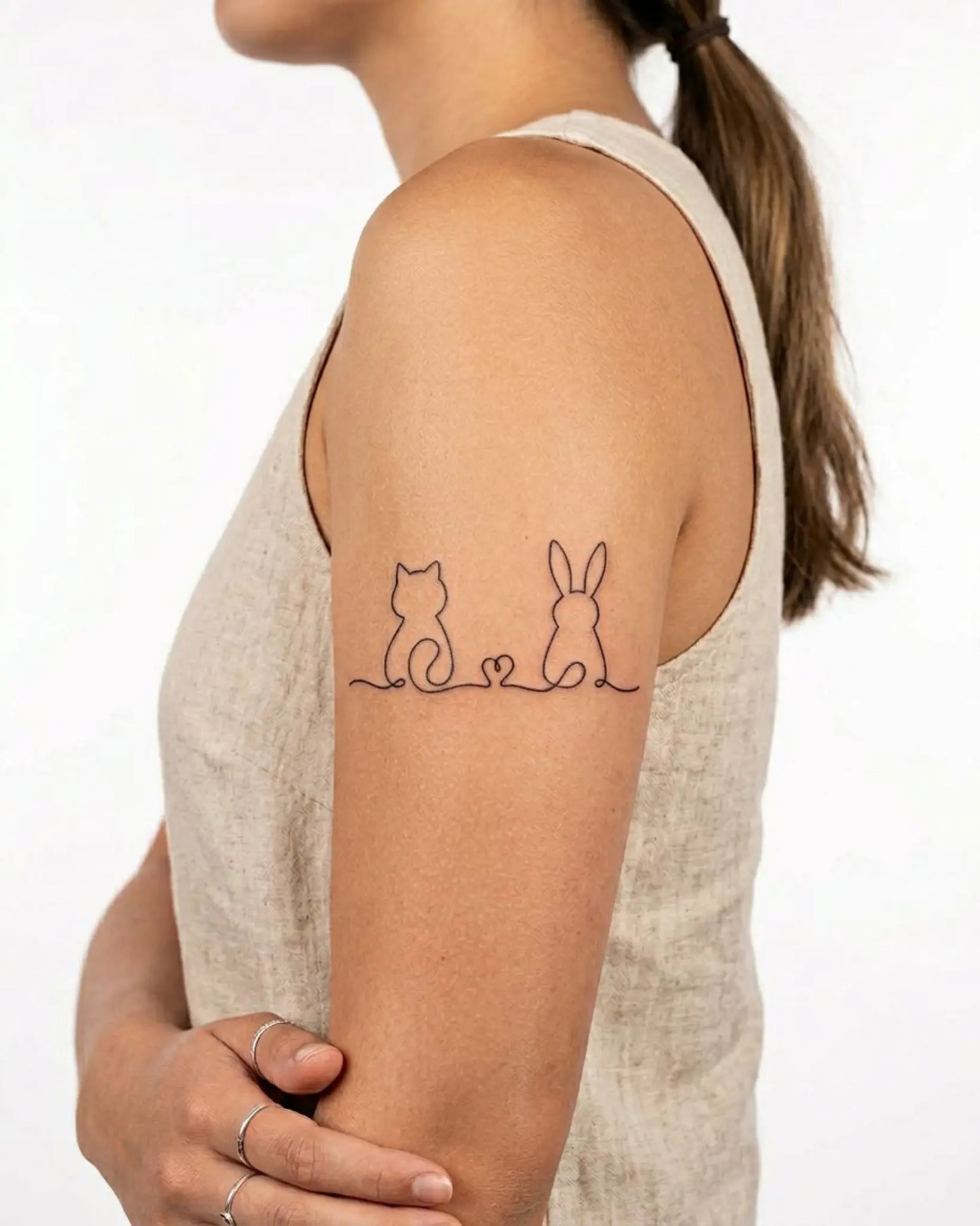 INKY Cat & Bunny semi-permanent tattoo applied on a woman – 3 x 3 in (7x7 cm) design, realistic ink look, lasts 10 days