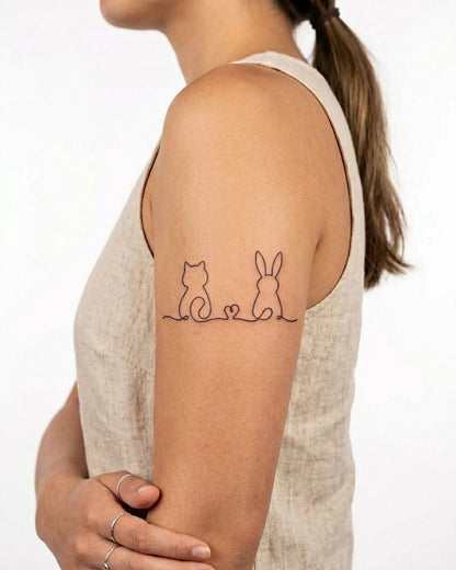 INKY Cat & Bunny semi-permanent tattoo applied on a woman – 3 x 3 in (7x7 cm) design, realistic ink look, lasts 10 days