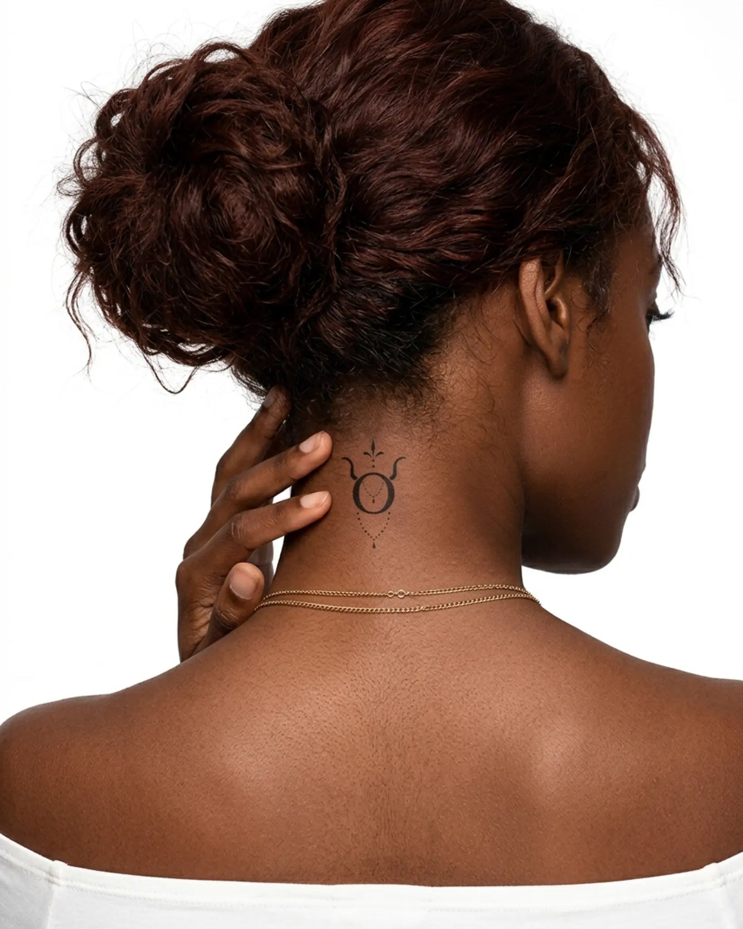 INKY Taurus Charm semi-permanent tattoo applied on a woman – 2 x 2 in (4x4 cm) design, realistic ink look, lasts 10 days