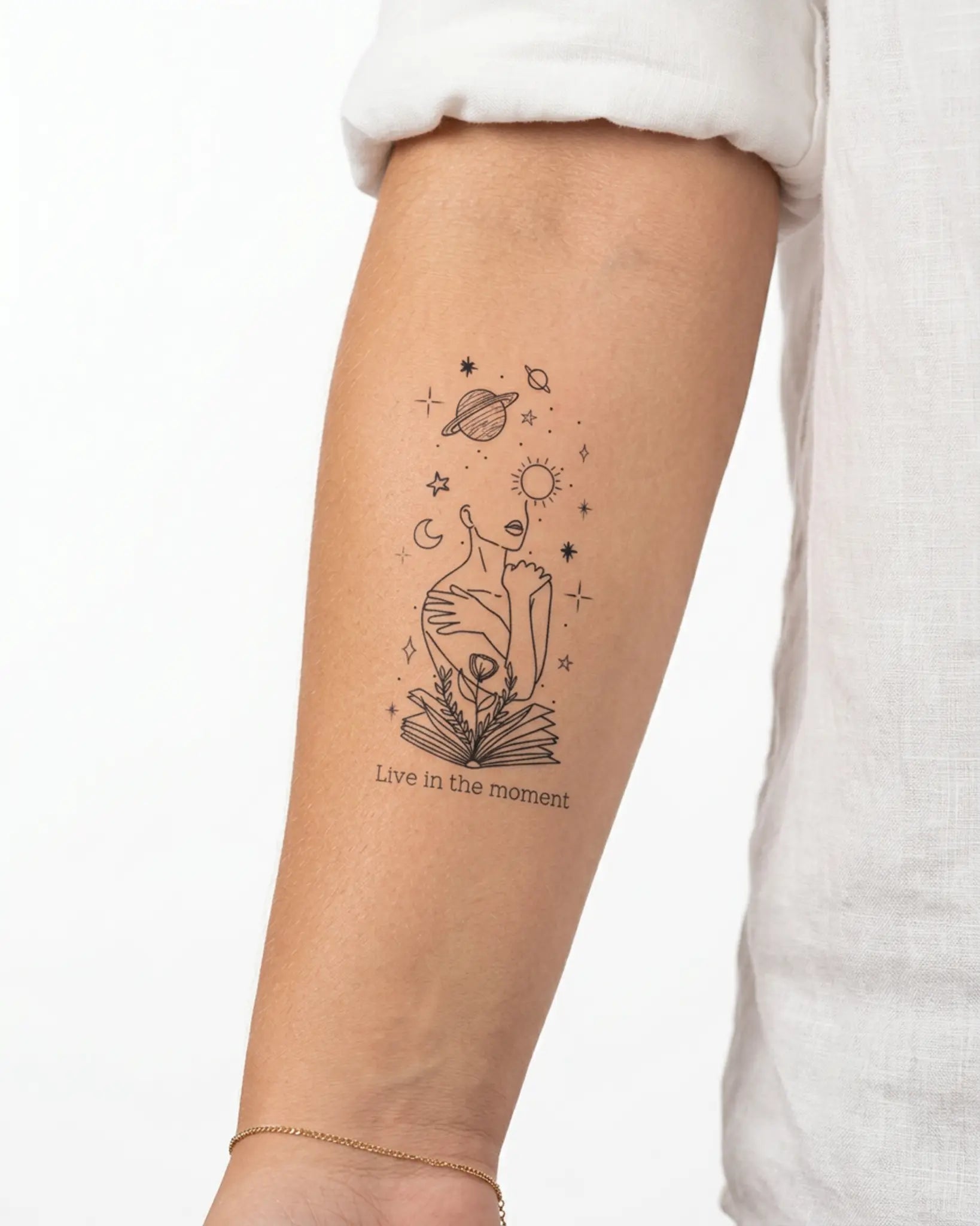 INKY Inner Cosmos semi-permanent tattoo applied on a woman – 2 x 4 in (6x10 cm) design, realistic ink look, lasts 10 days