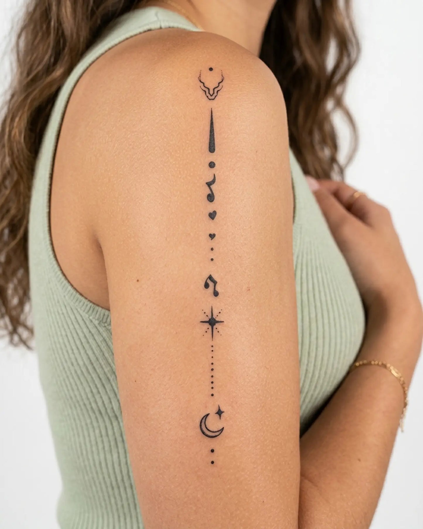 INKY Cosmic Flow 2 semi-permanent tattoo applied on a woman – 4 x 7 in (10x17 cm) design, realistic ink look, lasts 10 days