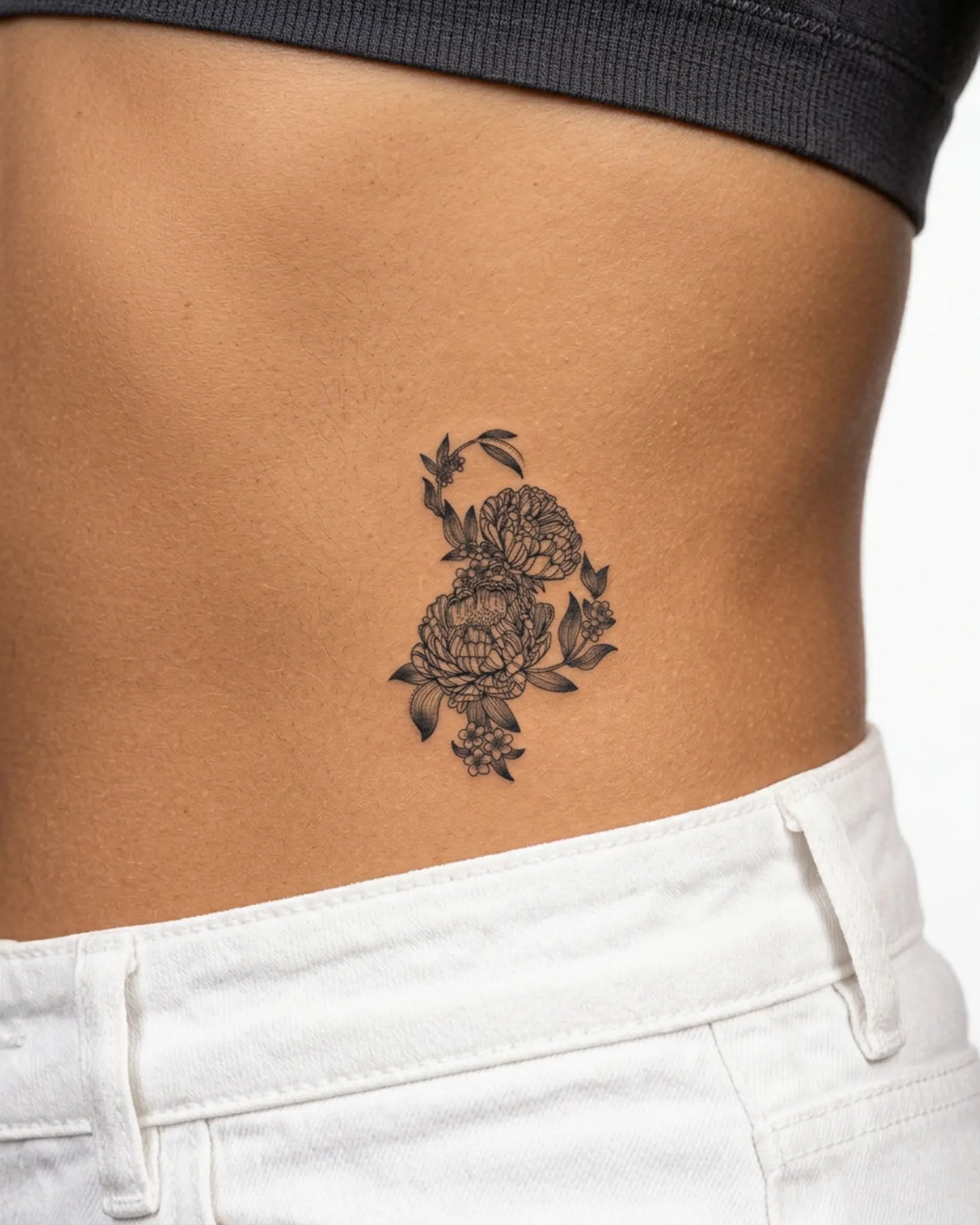 INKY Peony Bloom semi-permanent tattoo applied on a woman – 3 x 4 in (7x10 cm) design, realistic ink look, lasts 10 days