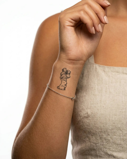 INKY Bunny Lily 2 semi-permanent tattoo applied on a woman – 2 x 2 in (4x4 cm) design, realistic ink look, lasts 10 days