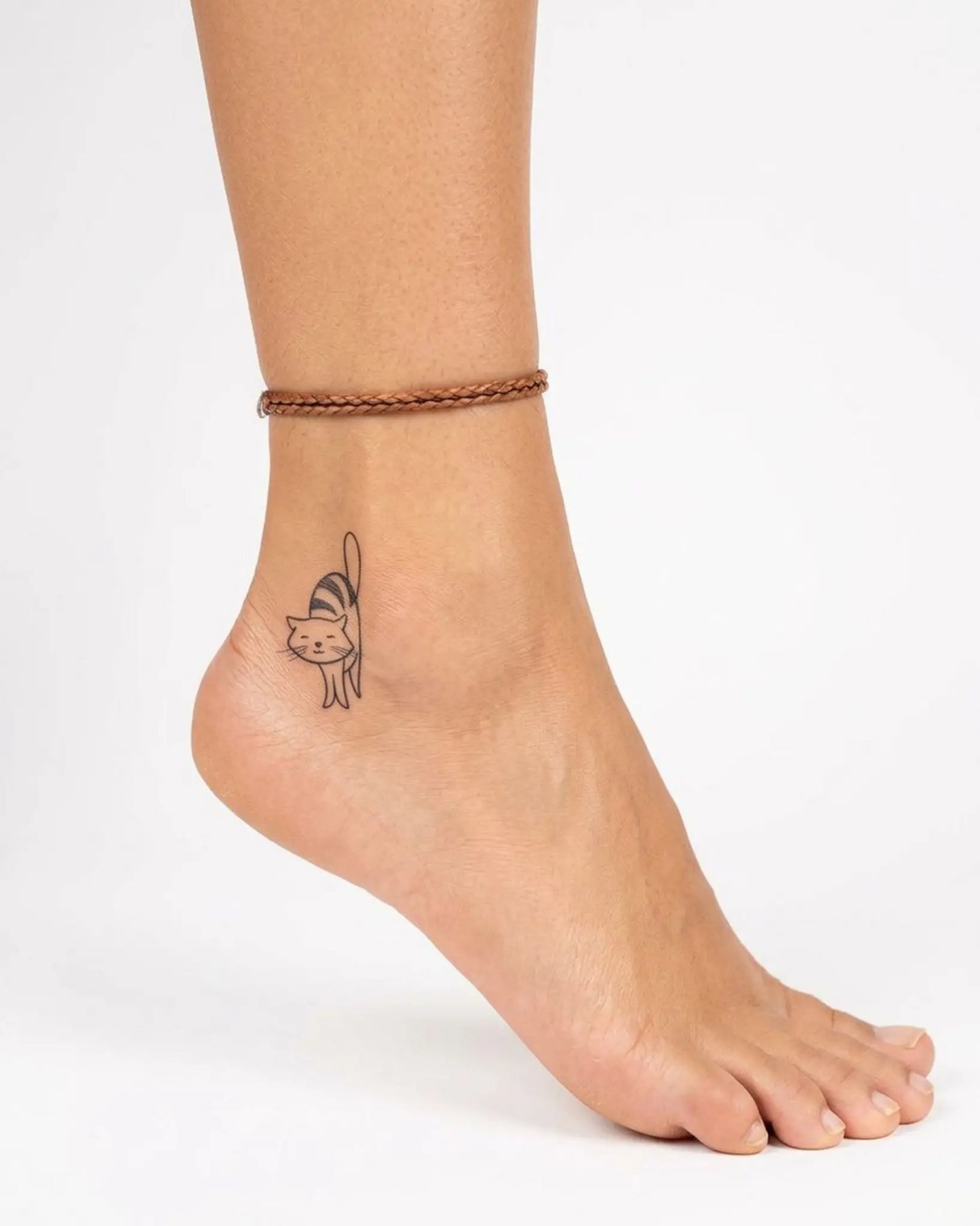 INKY Kitty Stretch semi-permanent tattoo applied on a woman – 2 x 2 in (4x4 cm) design, realistic ink look, lasts 10 days