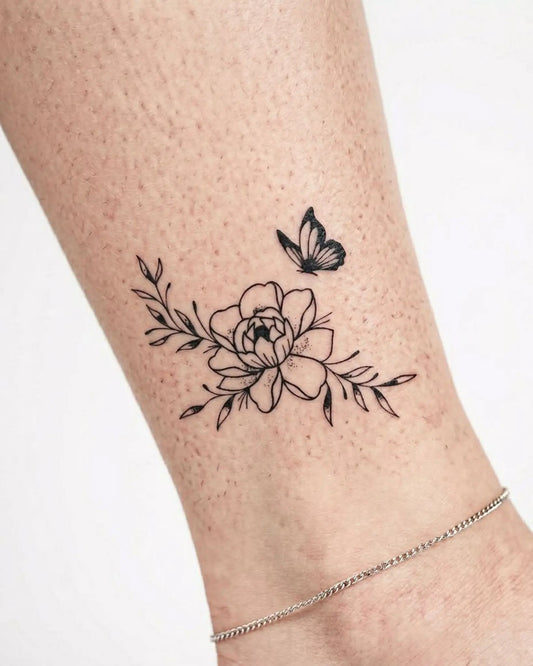 INKY Flora & Fly semi-permanent tattoo applied on a woman – 3 x 3 in (7x7 cm) design, realistic ink look, lasts 10 days