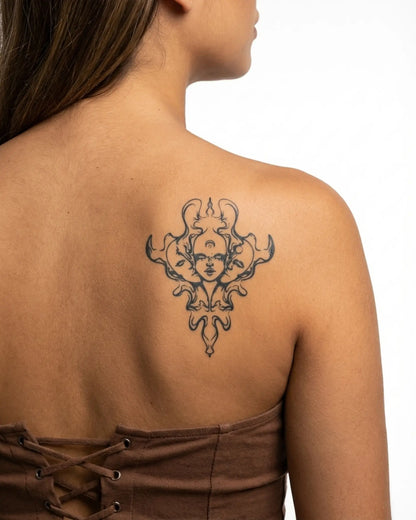 INKY Mystic Faces semi-permanent tattoo applied on a woman – 3 x 4 in (7x10 cm) design, realistic ink look, lasts 10 days
