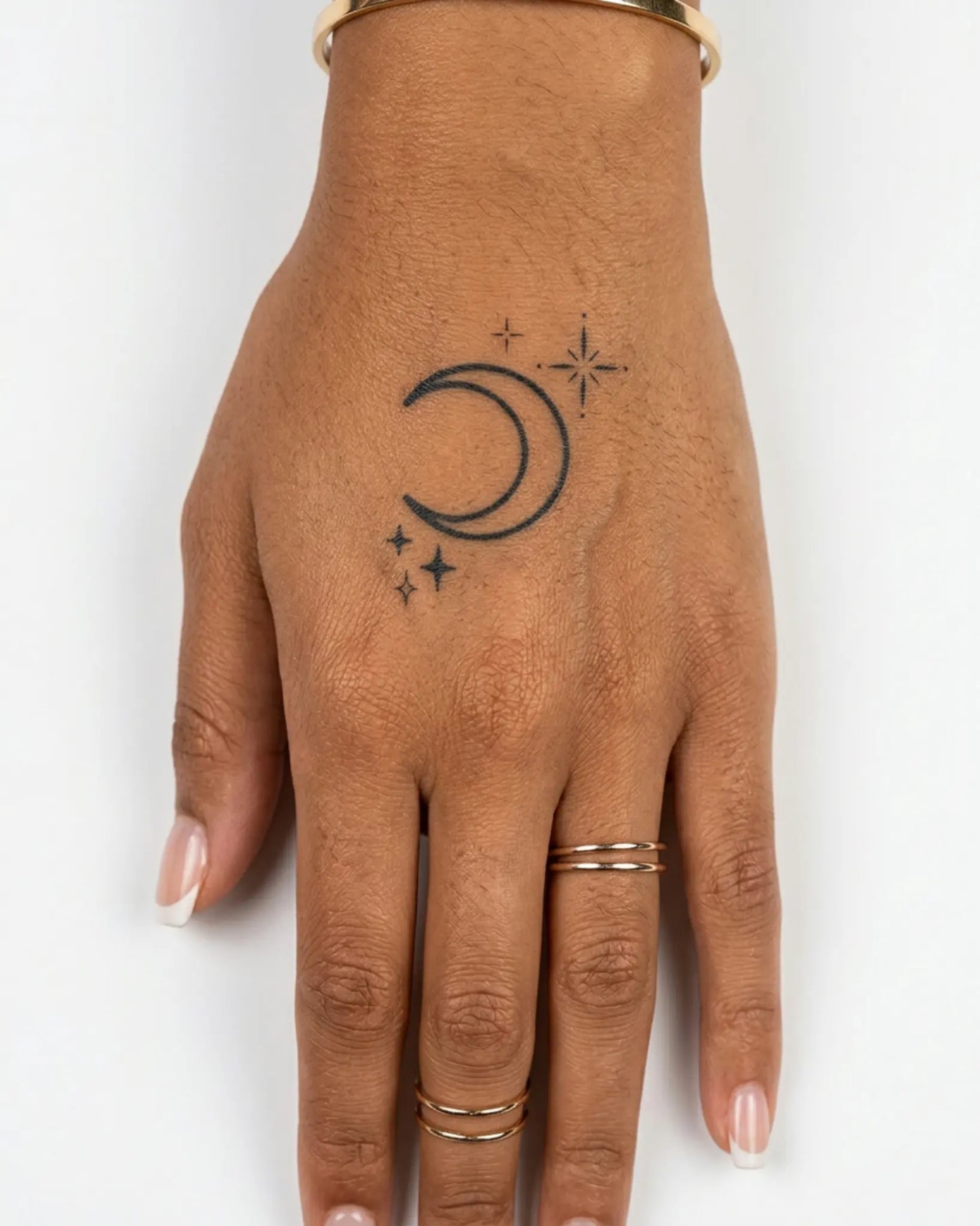 INKY Celestial semi-permanent tattoo applied on a woman – 2 x 2 in (4x4 cm) design, realistic ink look, lasts 10 days