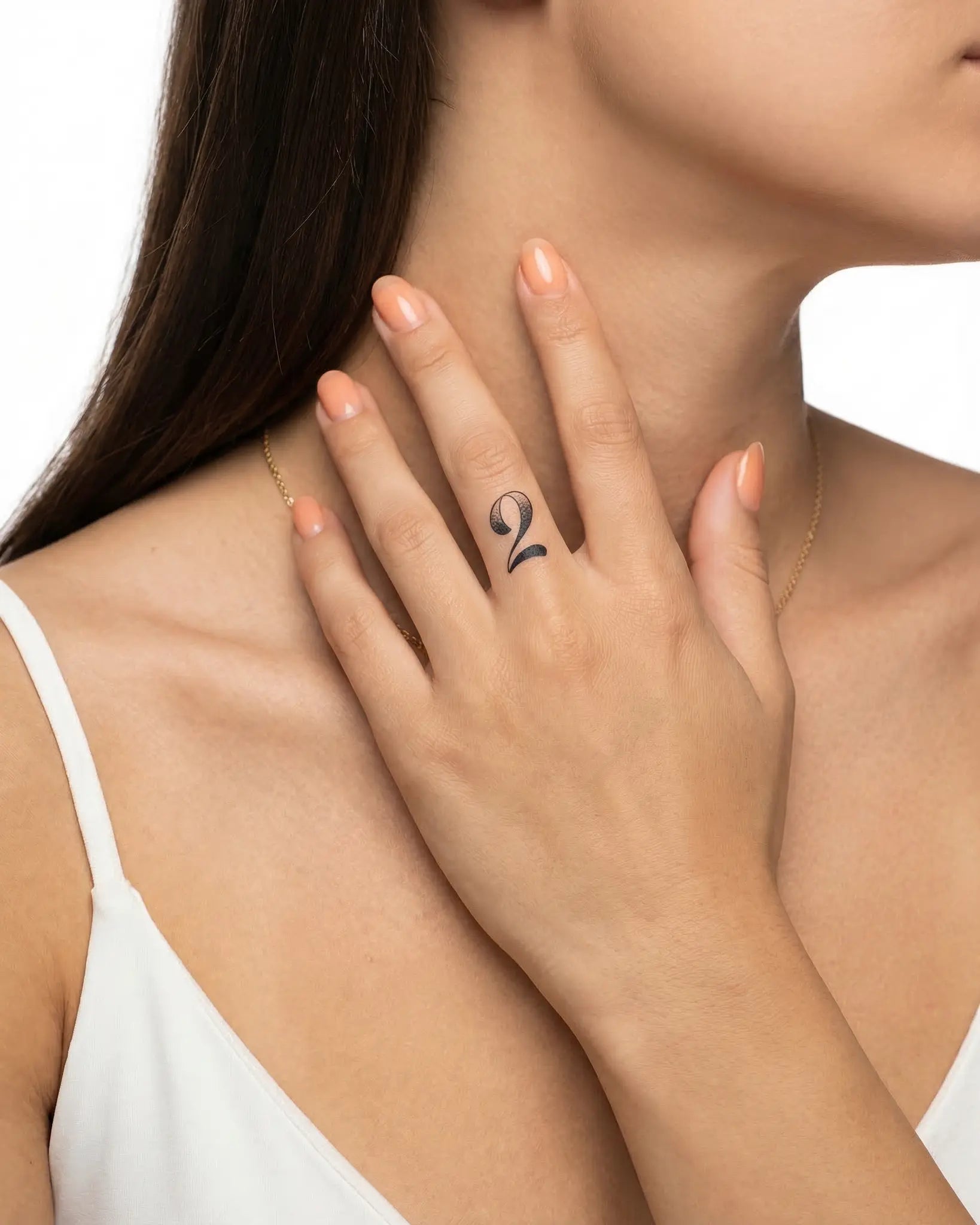 INKY Dotwork Two semi-permanent tattoo applied on a woman – 0.5 x 0.5 in (1x1 cm) design, realistic ink look, lasts 10 days