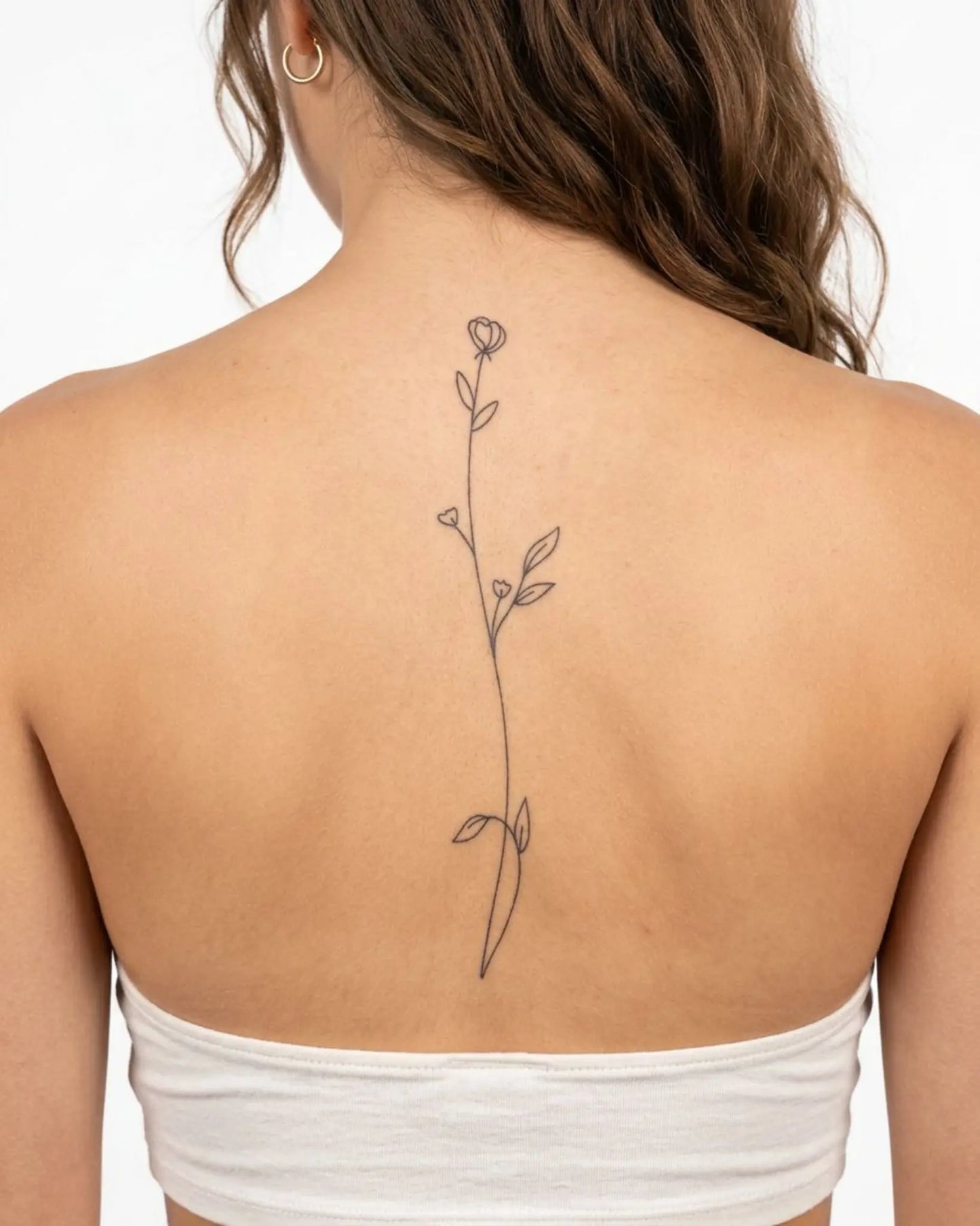 INKY Stem semi-permanent tattoo applied on a woman – 4 x 8 in (11x20 cm) design, realistic ink look, lasts 10 days