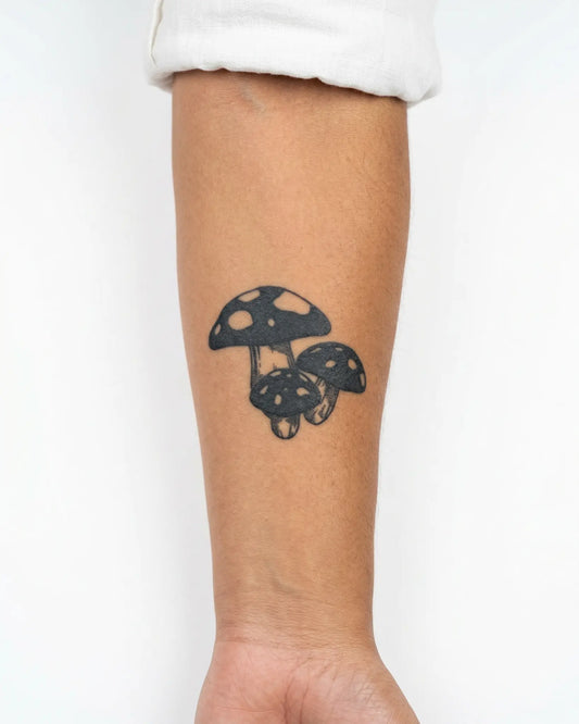 INKY Shroom Trio semi-permanent tattoo applied on a woman – 3 x 3 in (7x7 cm) design, realistic ink look, lasts 10 days