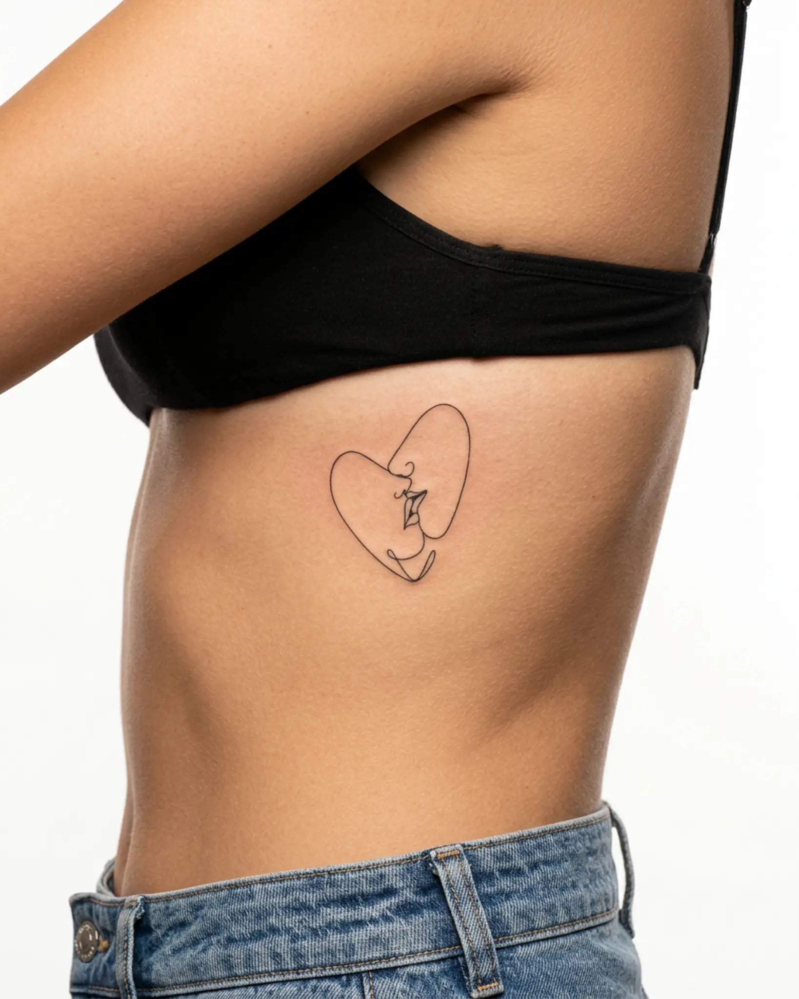 INKY Love Line 2 semi-permanent tattoo applied on a woman – 3 x 3 in (7x7 cm) design, realistic ink look, lasts 10 days