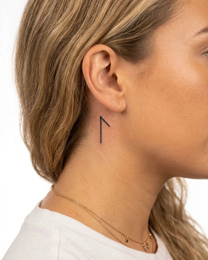 INKY Nordic Rune 2 semi-permanent tattoo applied on a woman – 0.5 x 0.5 in (1x1 cm) design, realistic ink look, lasts 10 days