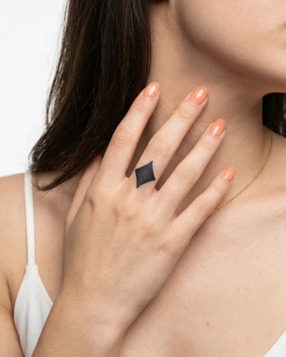 INKY Diamond semi-permanent tattoo applied on a woman – 0.5 x 0.5 in (1x1 cm) design, realistic ink look, lasts 10 days
