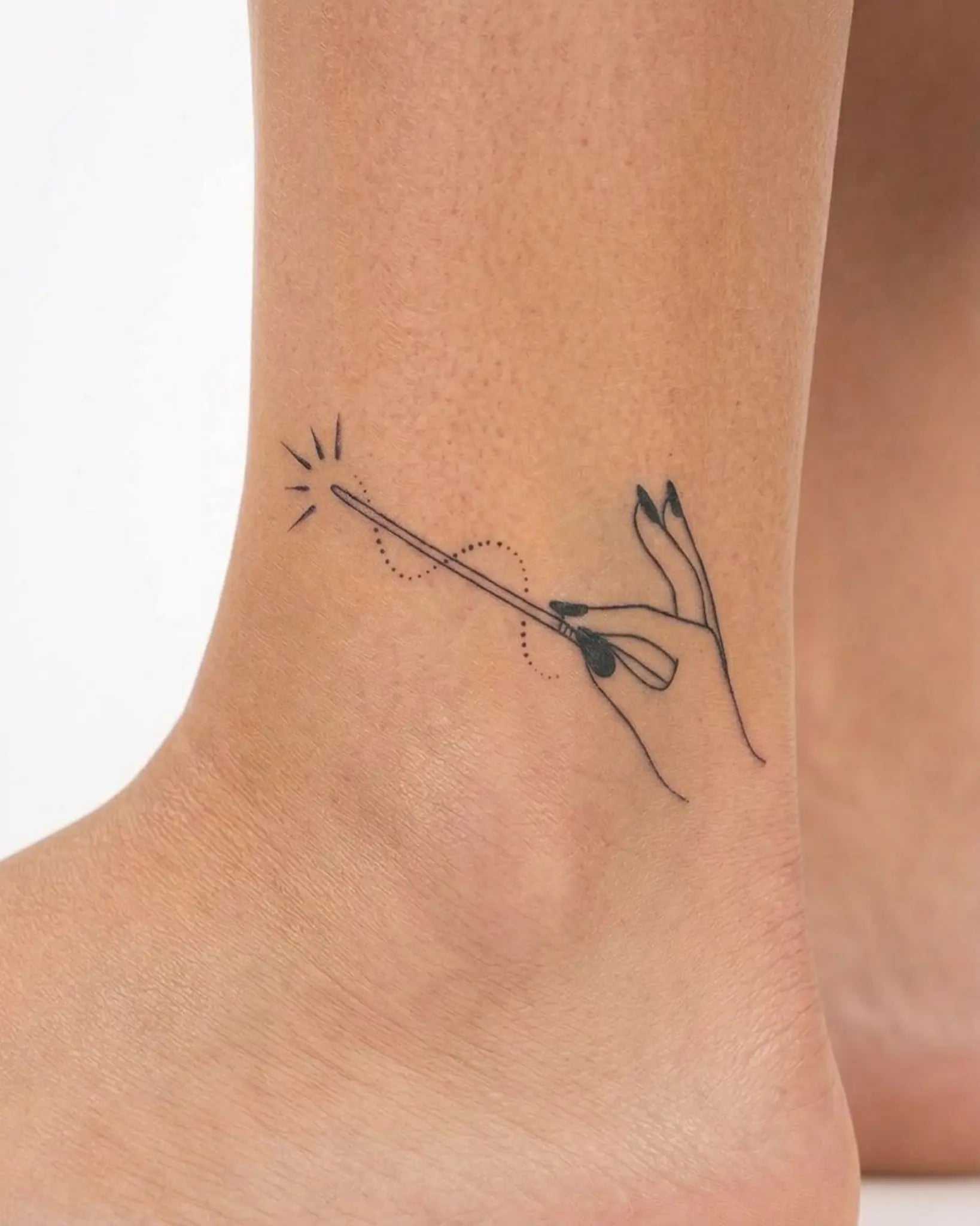 INKY Magic Hand semi-permanent tattoo applied on a woman – 2 x 2 in (4x4 cm) design, realistic ink look, lasts 10 days