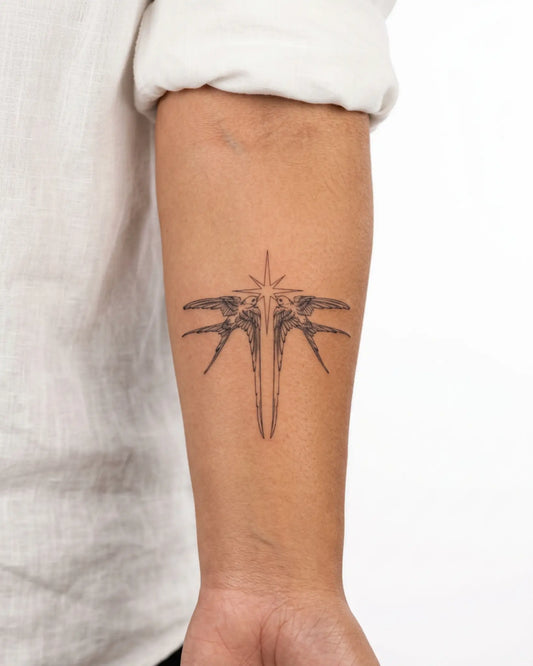 INKY Star Swallows semi-permanent tattoo applied on a woman – 3 x 3 in (7x7 cm) design, realistic ink look, lasts 10 days