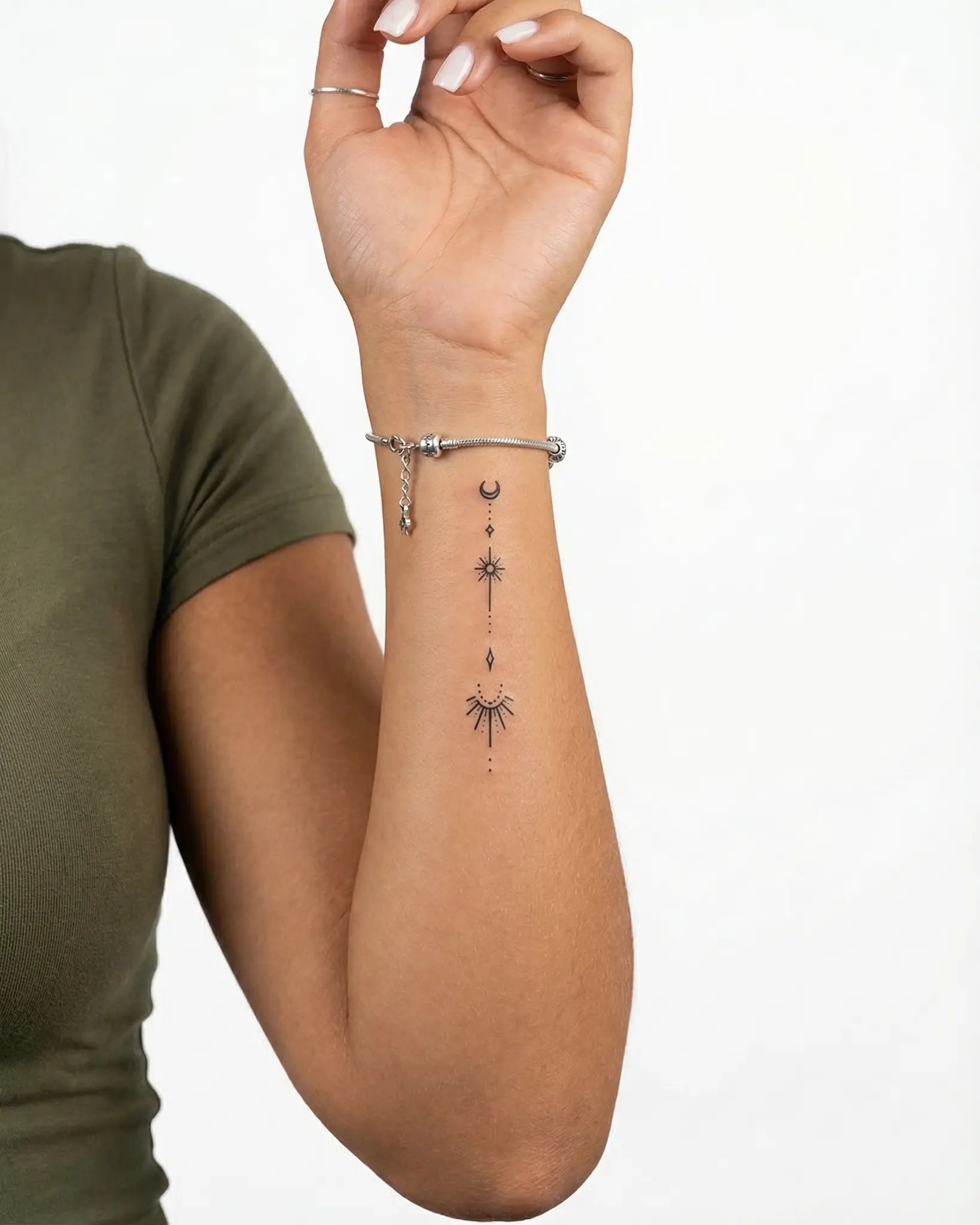 INKY Cosmic Trail semi-permanent tattoo applied on a woman – 2 x 4 in (6x10 cm) design, realistic ink look, lasts 10 days