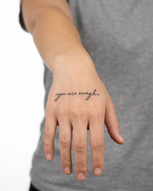 INKY You Are Enough 2 2 semi-permanent tattoo applied on a woman – 2 x 2 in (4x4 cm) design, realistic ink look, lasts 10 days