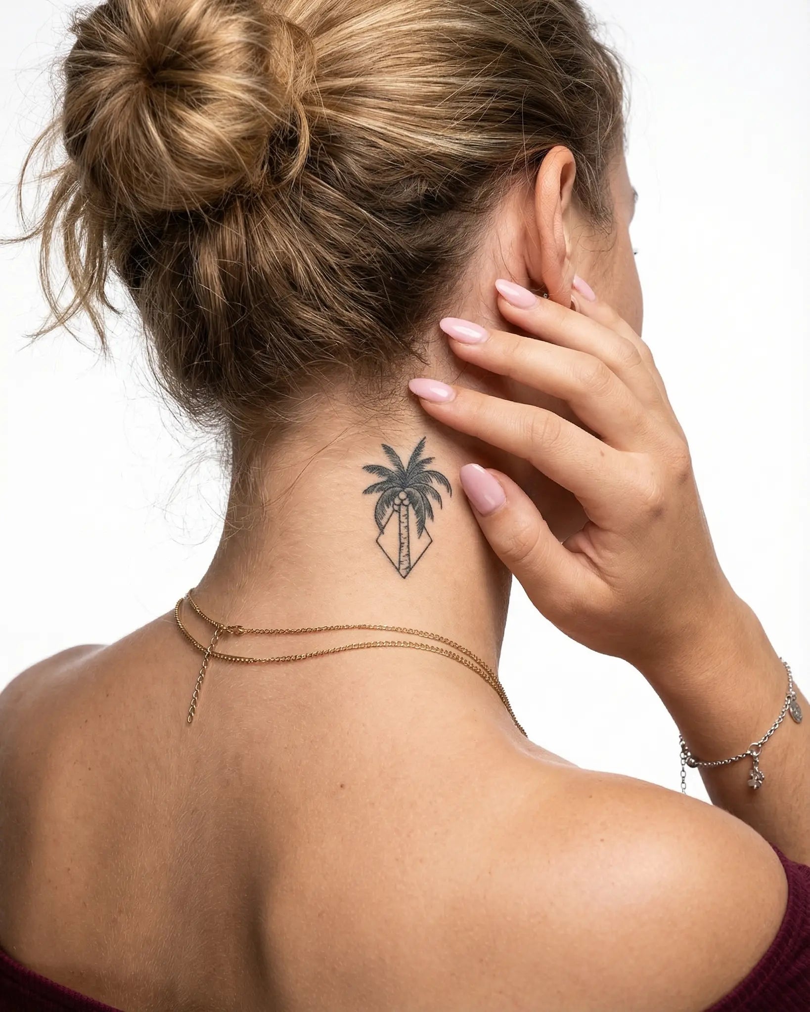 INKY Geo Palm semi-permanent tattoo applied on a woman – 2 x 2 in (4x4 cm) design, realistic ink look, lasts 10 days