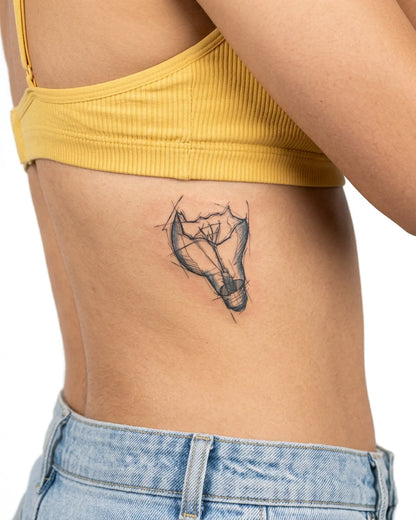 INKY Idea Sketch semi-permanent tattoo applied on a woman – 3 x 3 in (7x7 cm) design, realistic ink look, lasts 10 days
